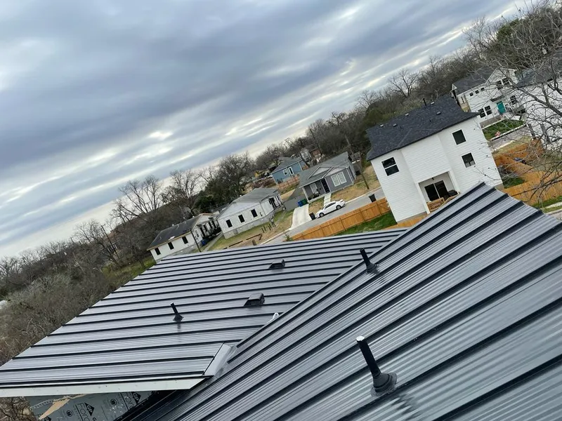 Standing seam metal roof panels with vents for Skylight Repair in Perry